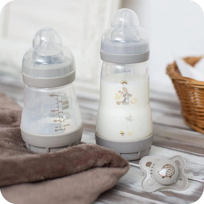 Feed & Soothe Set,Anti-Colic Newborn Bottle Set Complete with Baby Soothers, Ivory MAM